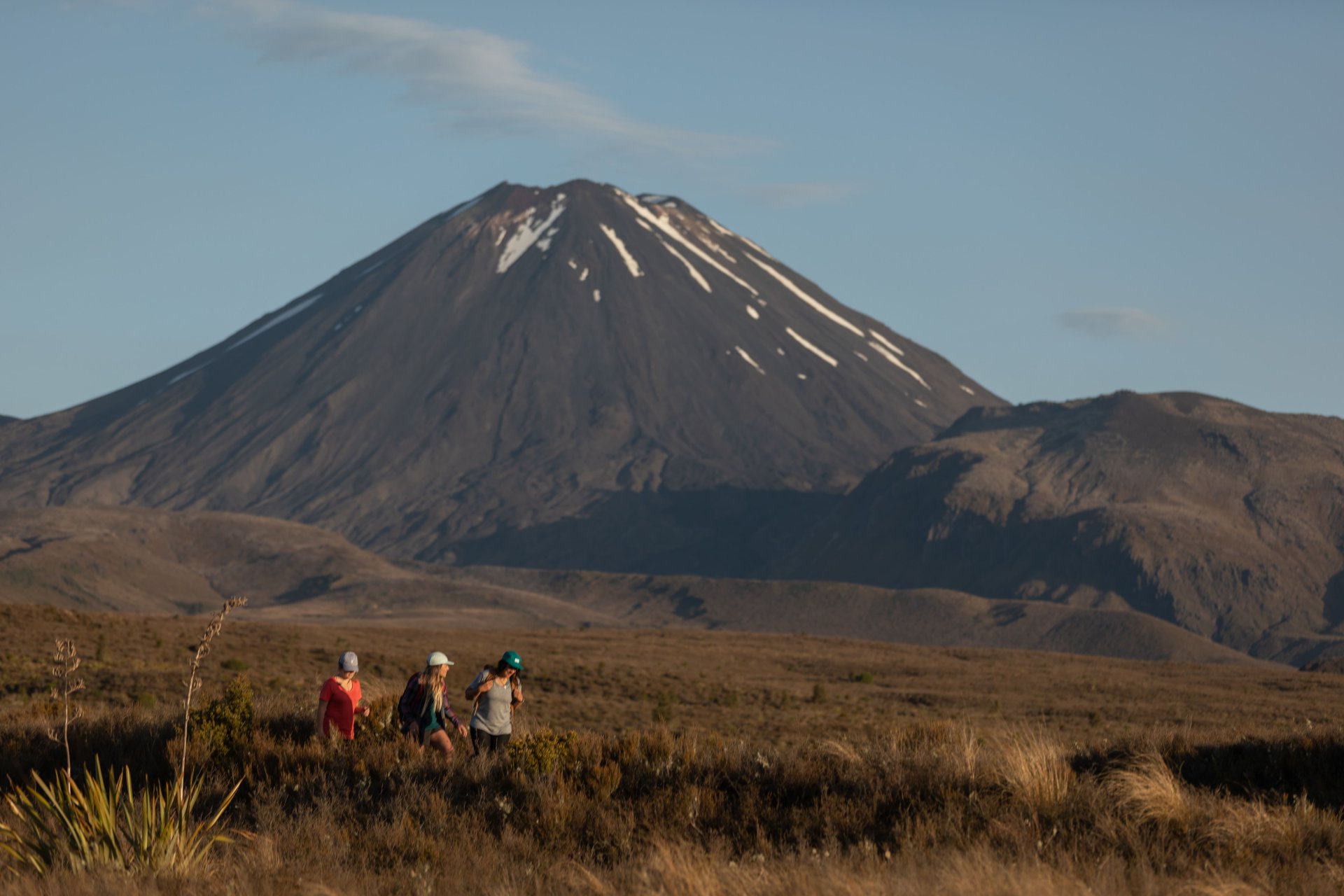 Hiking in Whakapapa Village in Tongariro National Park with Mt Ngauruhoe in background credit Visit Ruapehu-min